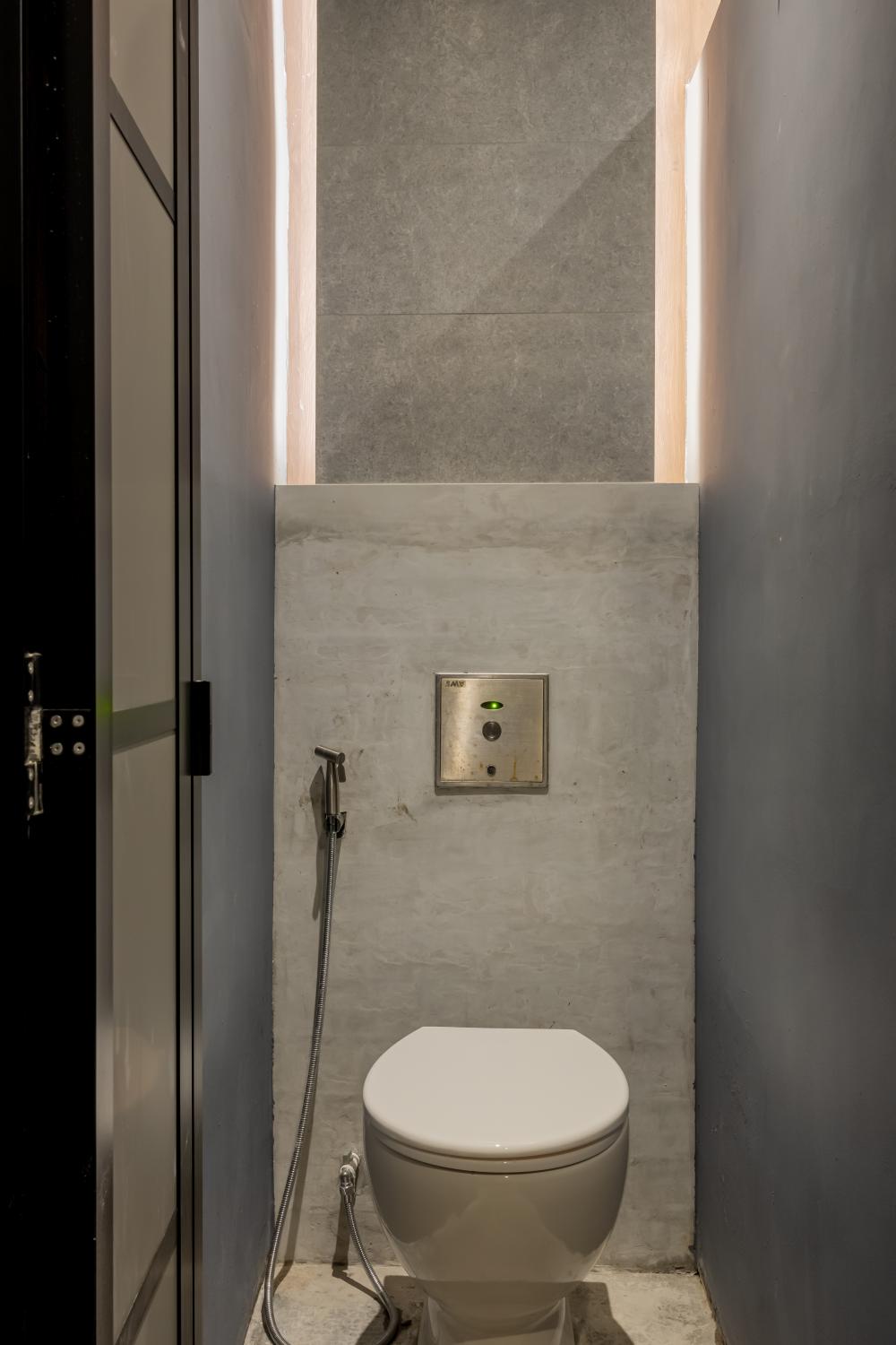 Modern Bathroom with Cement Floor and Bathroom Accessories