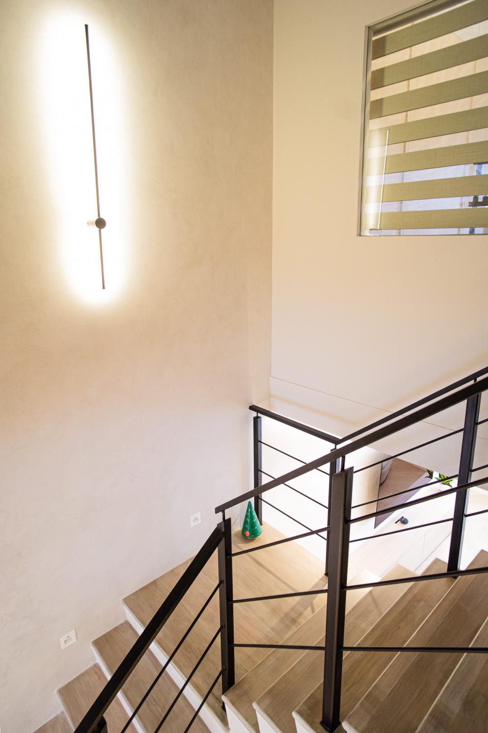 Modern Foyer with Artwork and Planters
