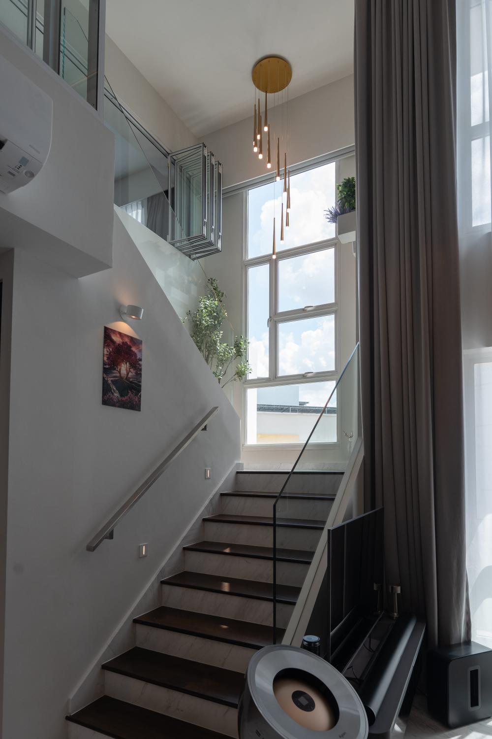 Modern Hallway with Drop Light and Staircase