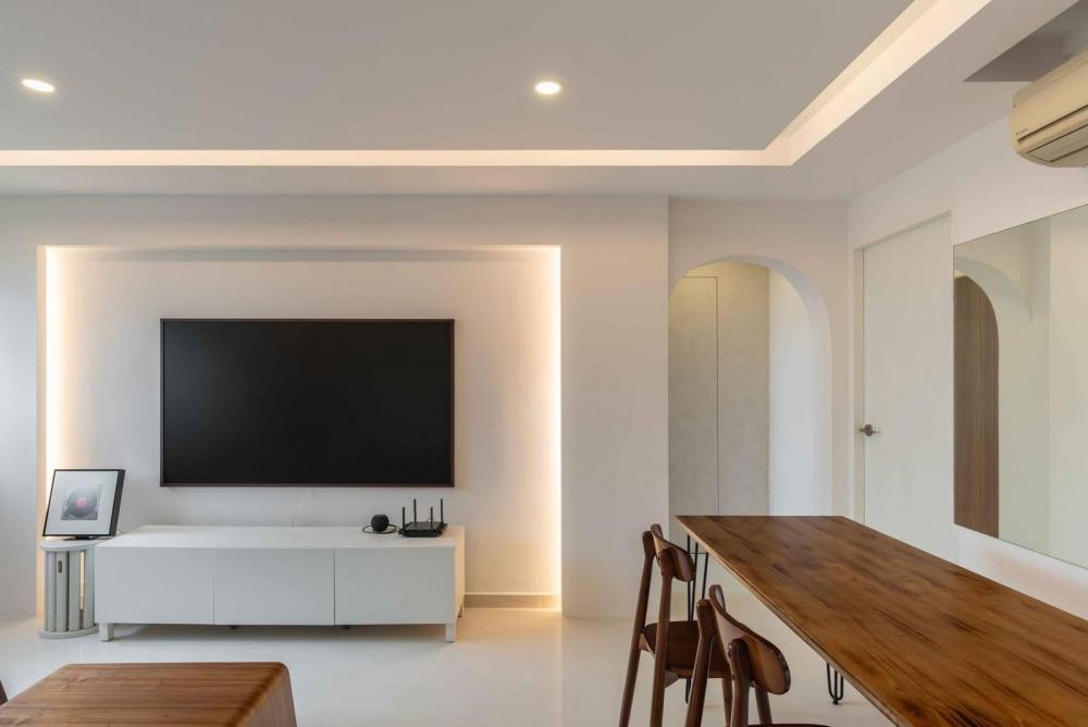 Minimalist Living Room with Homogeneous Tiles and TV Console
