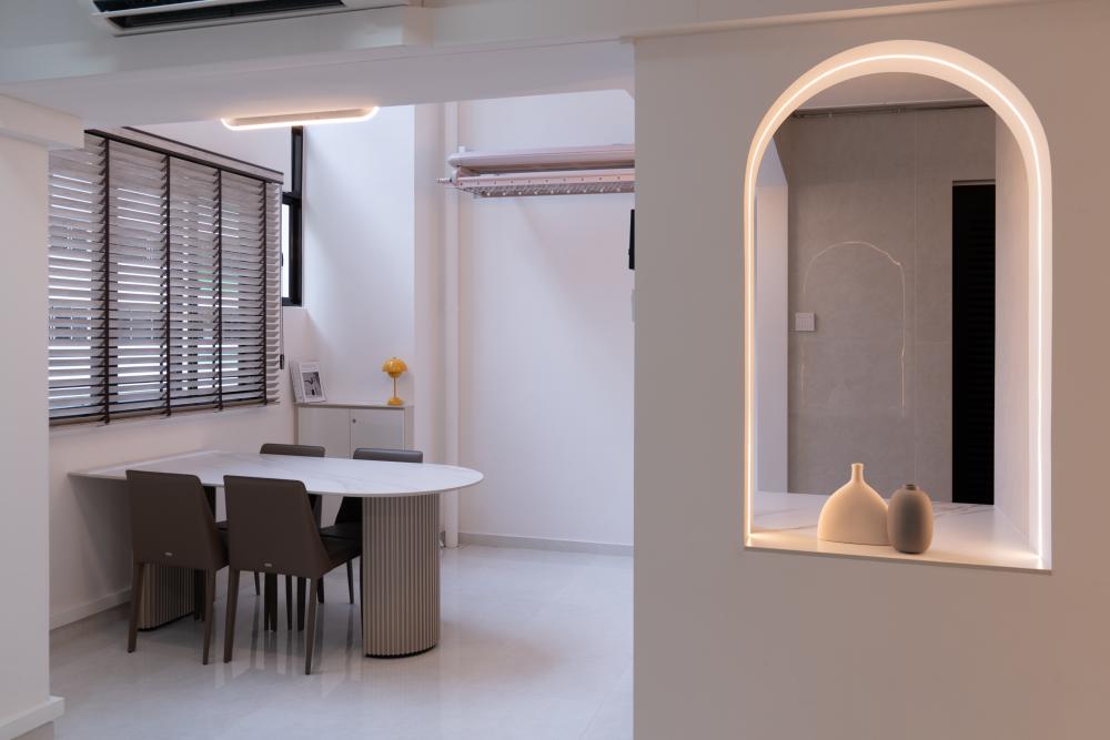 Minimalist Dining Room with Cove Lighting and Dining Table