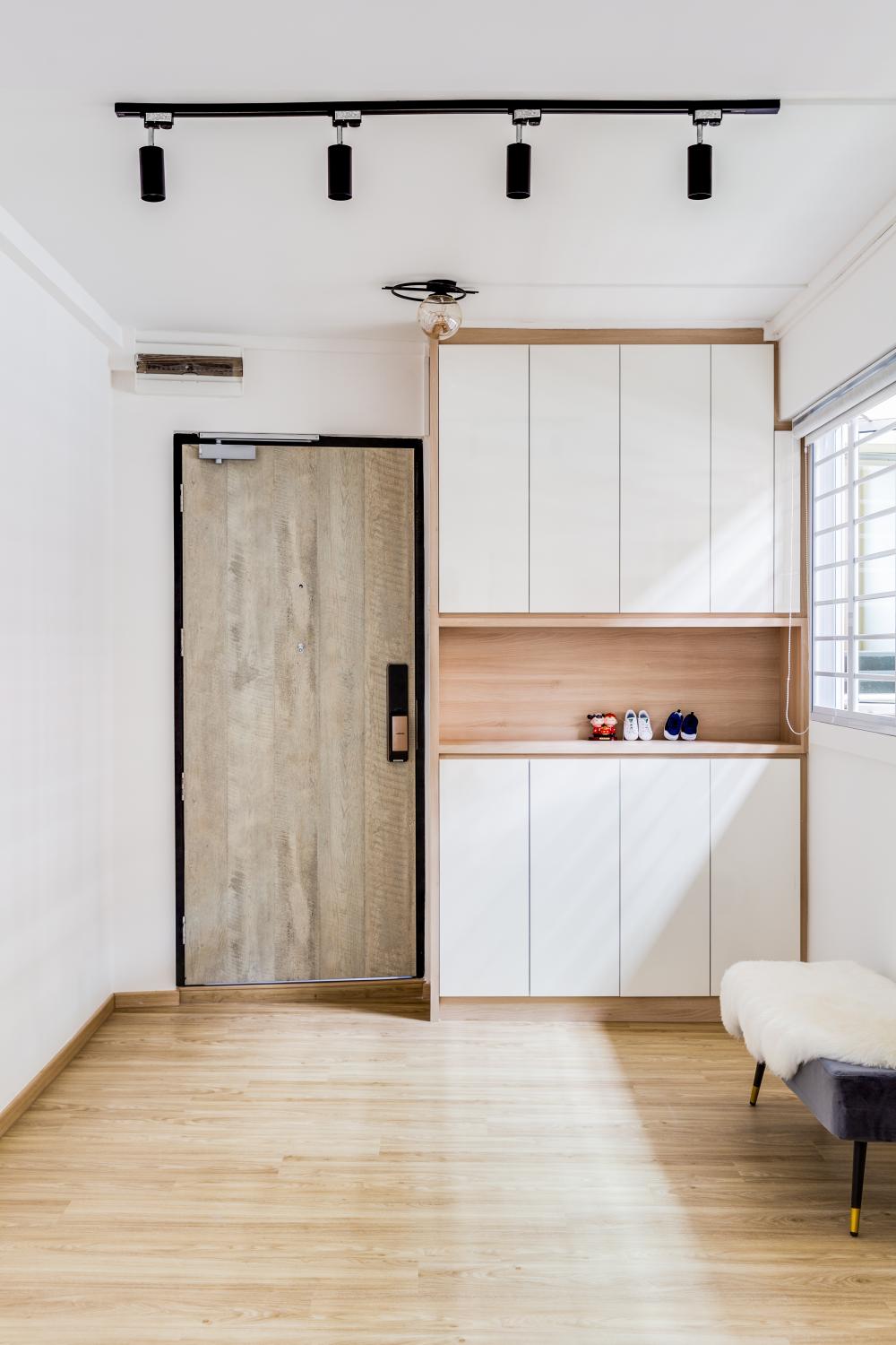 Minimalist Foyer with Console Table and Planters