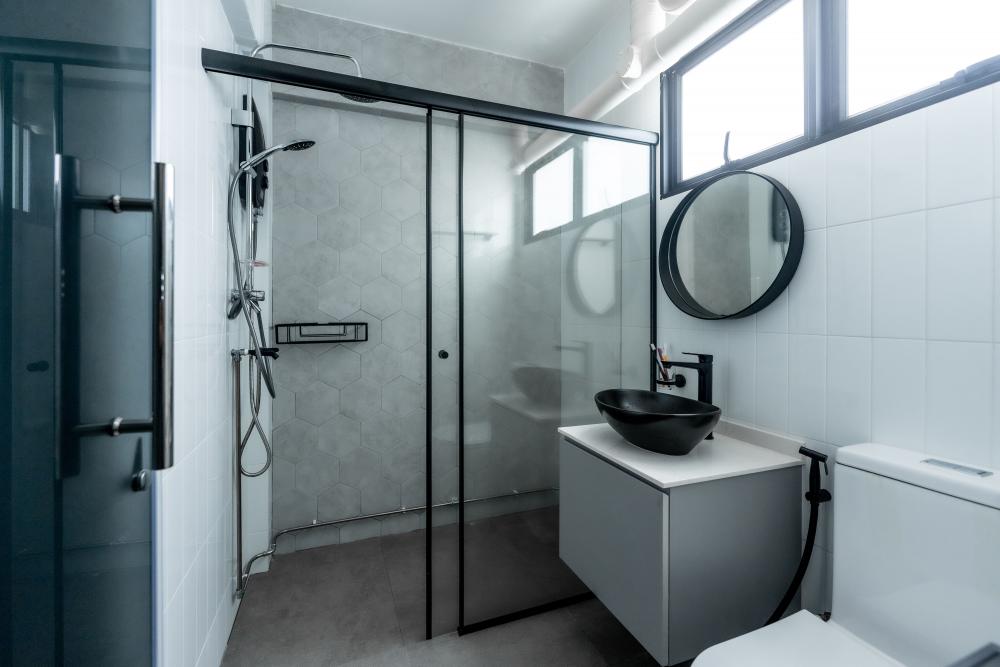 Scandinavian Bathroom with Homogeneous Tiles and Mirror