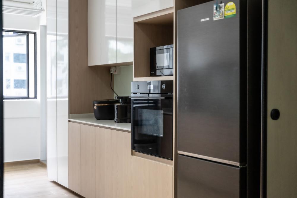 Scandinavian Kitchen with Kitchen Cabinets and Refrigerator