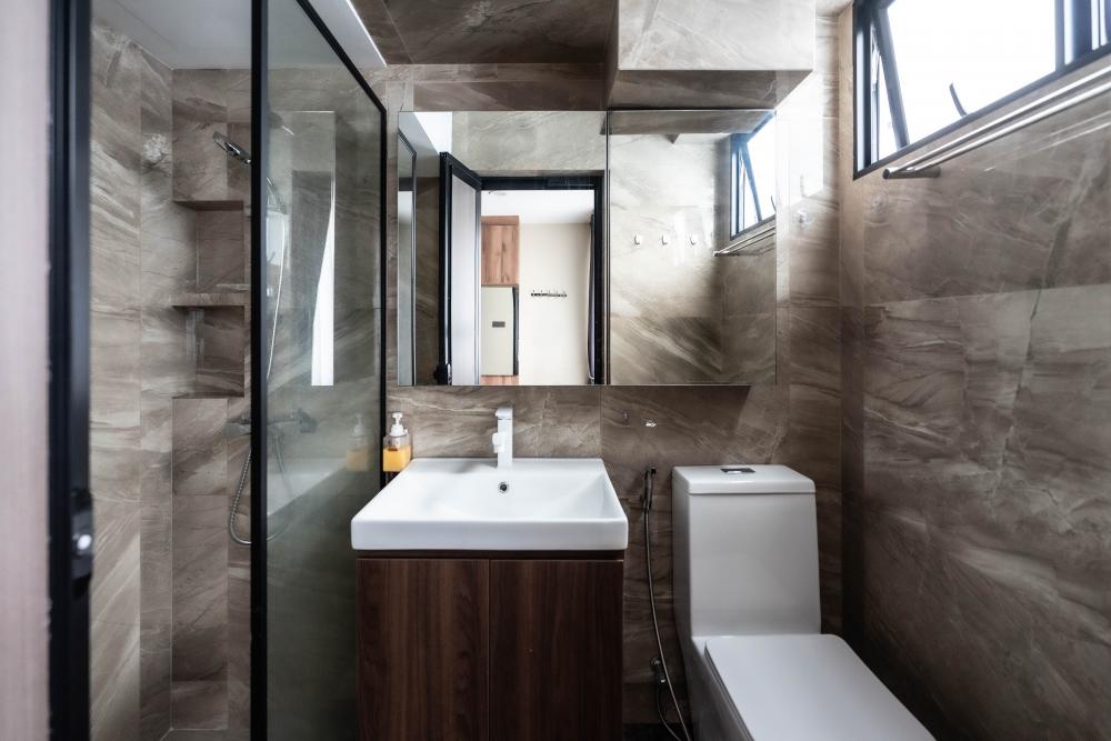 Modern Bathroom with Homogeneous Tiles and Mirror