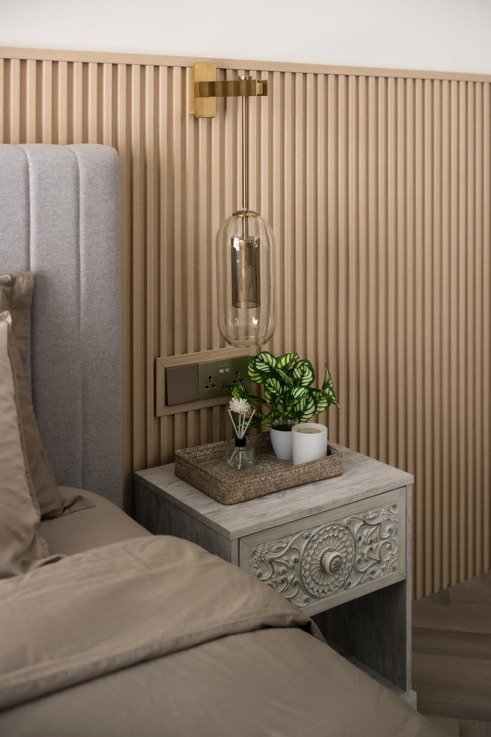 Eclectic Bedroom with Herringbone Tiling and Bedside Table