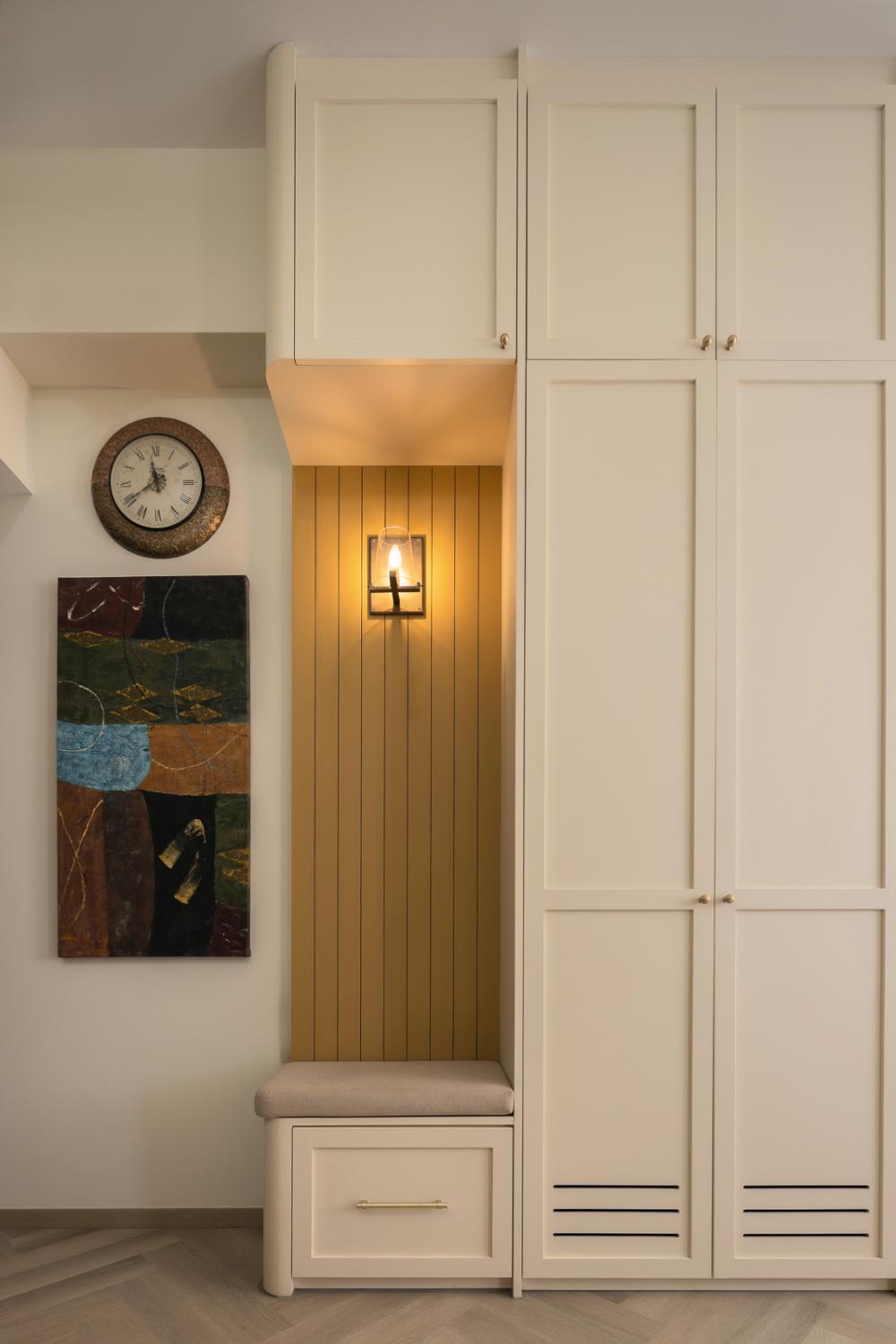Eclectic Entryway with Feature Wall and Seating Bench