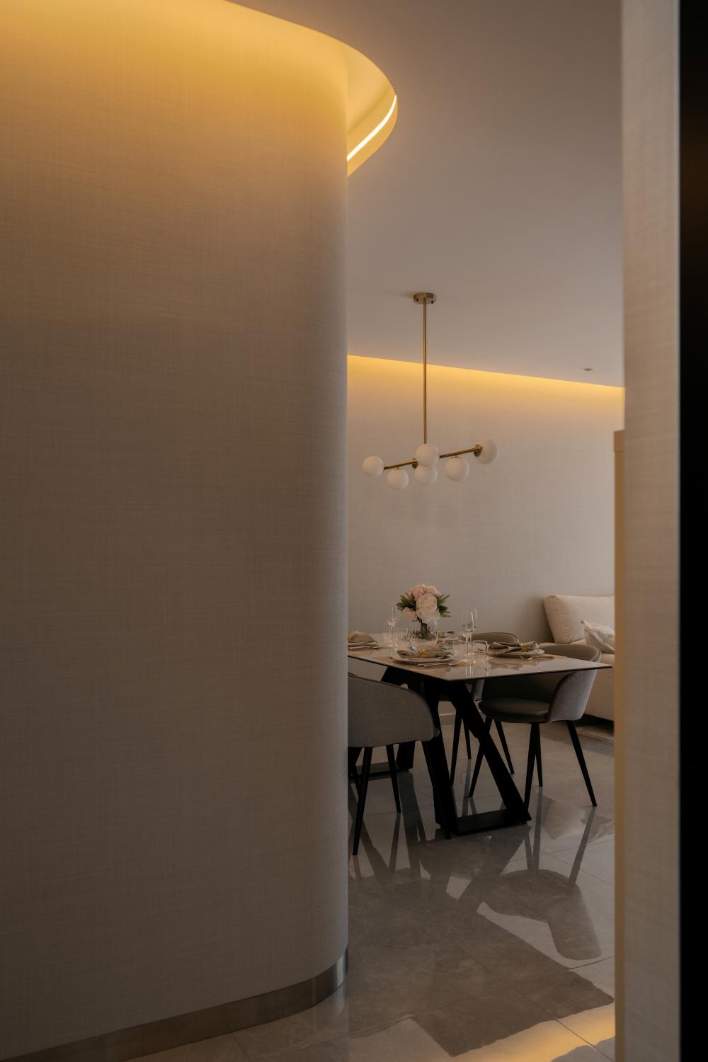 Modern Dining Room with Cove Lighting and Dining Table