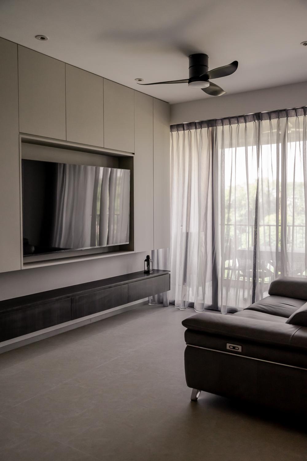 Modern Living Room with Bookshelf and Homogeneous Tiles