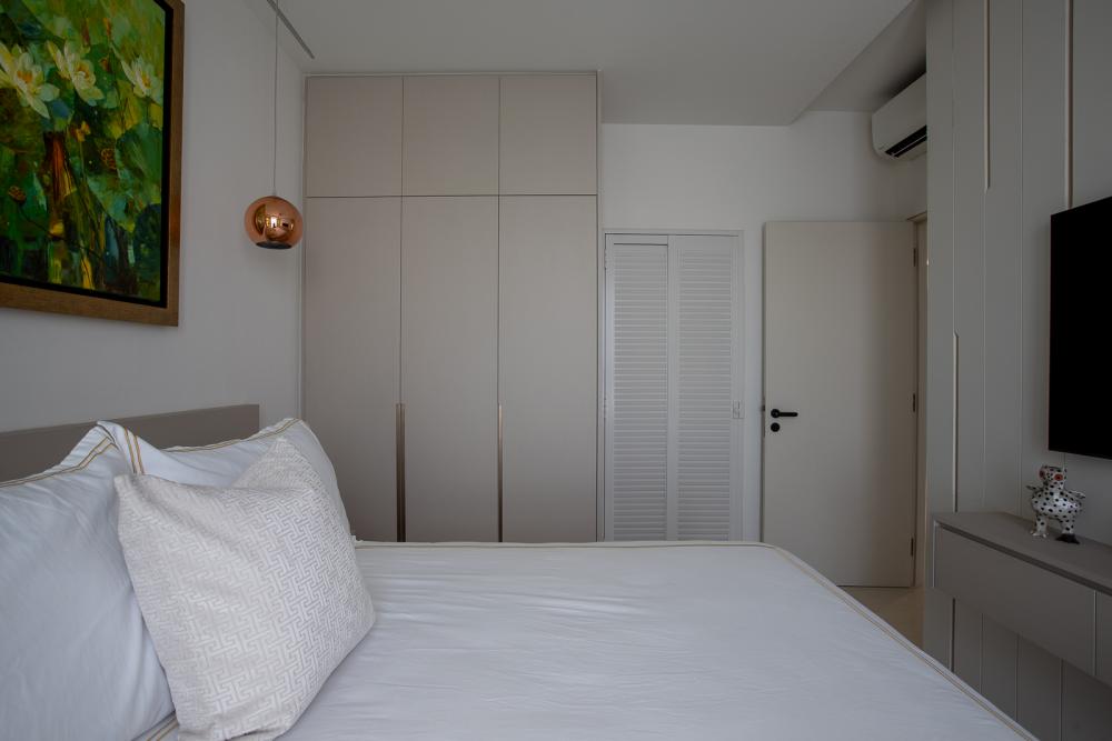 Modern Bedroom with TV Console and Feature Wall