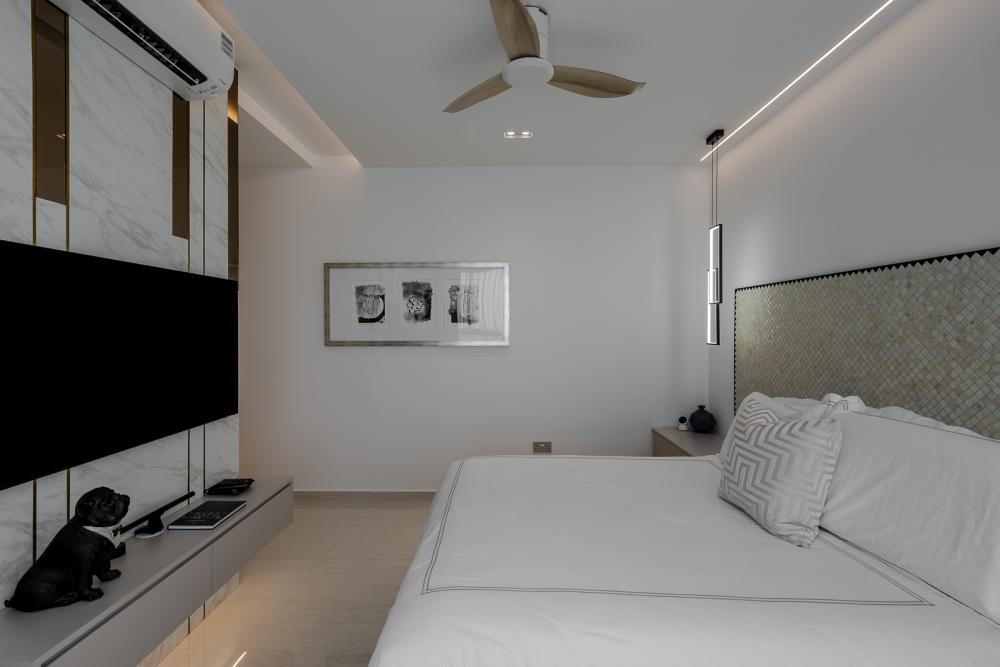 Modern Bedroom with Homogeneous Tiles and Feature Wall