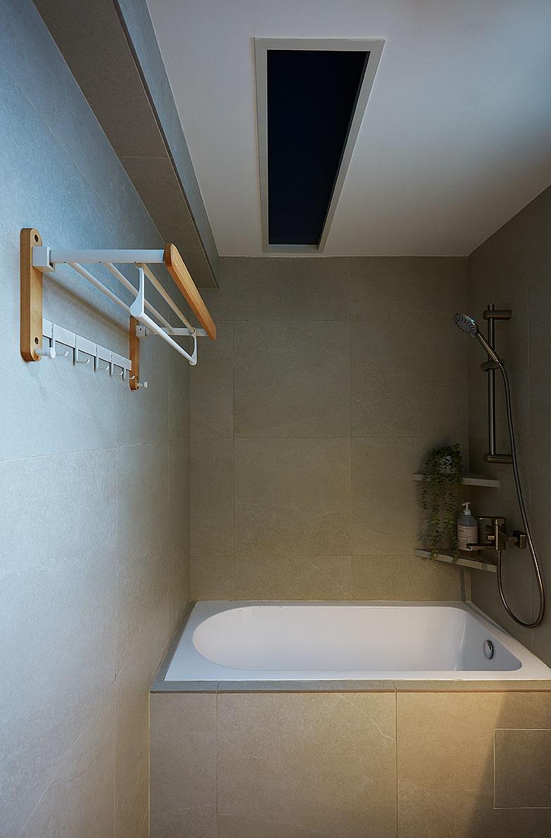 Scandinavian Bathroom with Bathtub and Bathroom Accessories