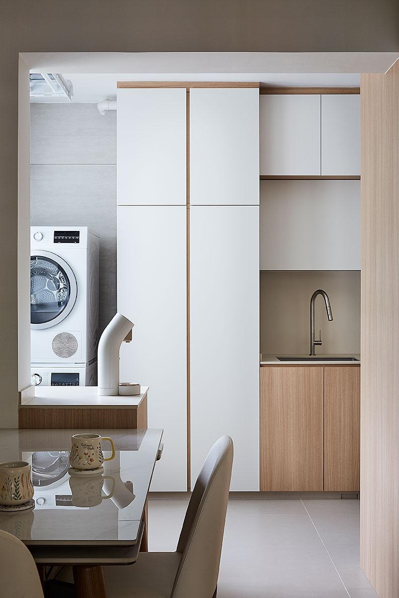 Scandinavian Dining Room with Washing Machine and Open Kitchen