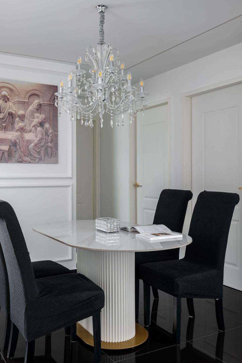 Modern Dining Room with Feature Wall and Chandelier