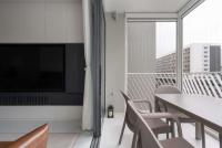 Modern New Condominium by Goodman Interior