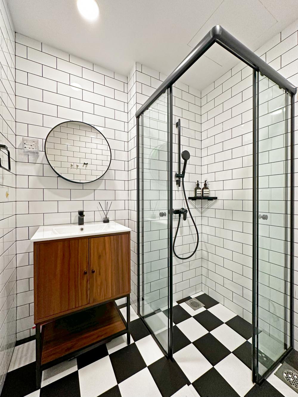 Scandinavian Bathroom with Mirror and Rainshower