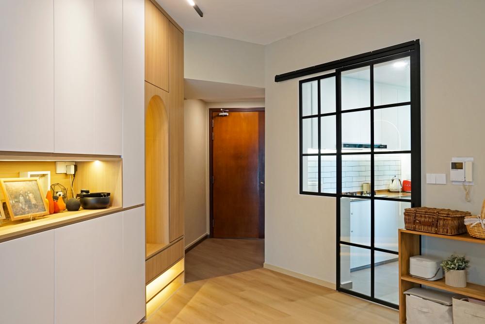 Scandinavian Entryway with Small Storage and Doors