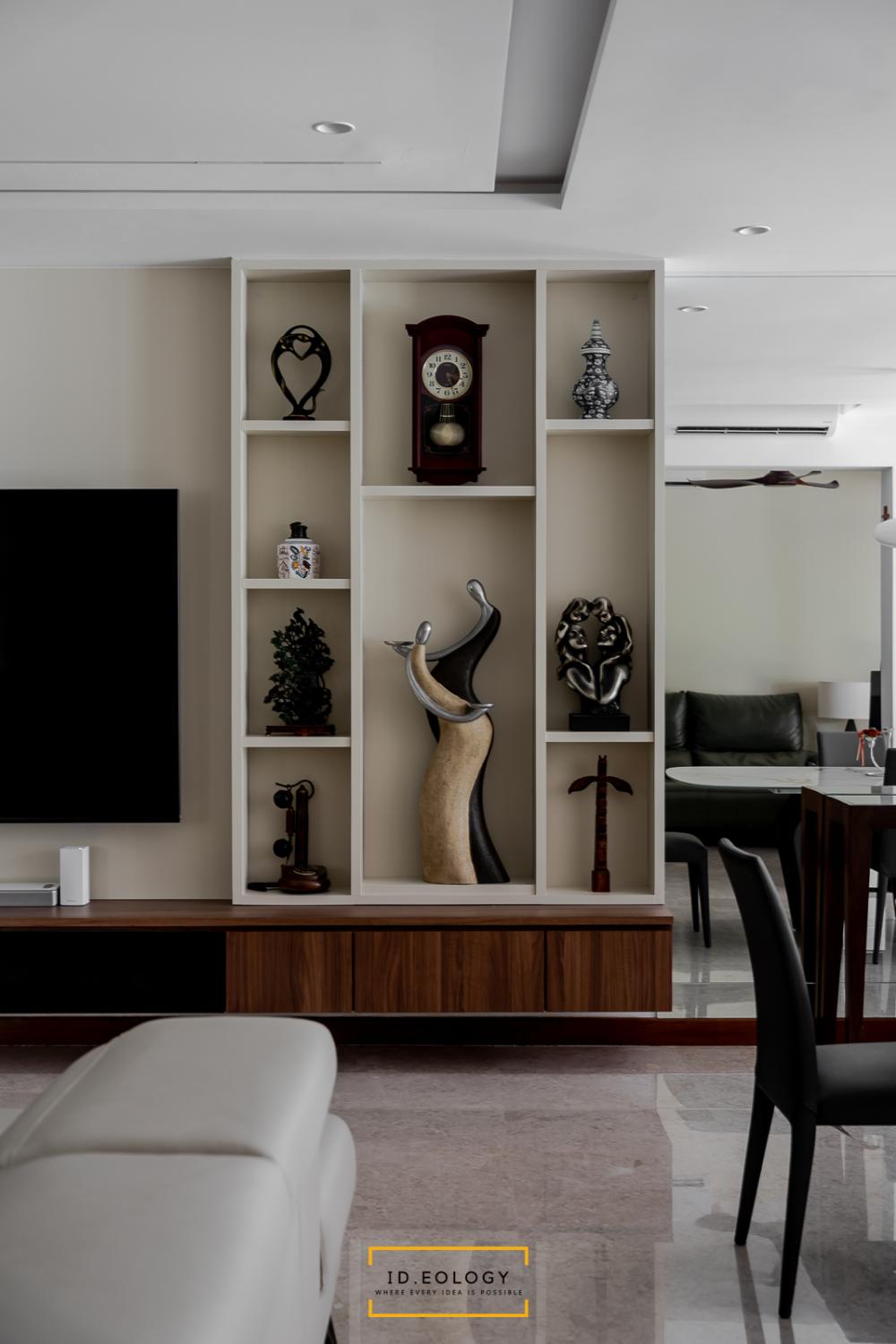 Contemporary Living Room with Cove Lighting and Chandelier