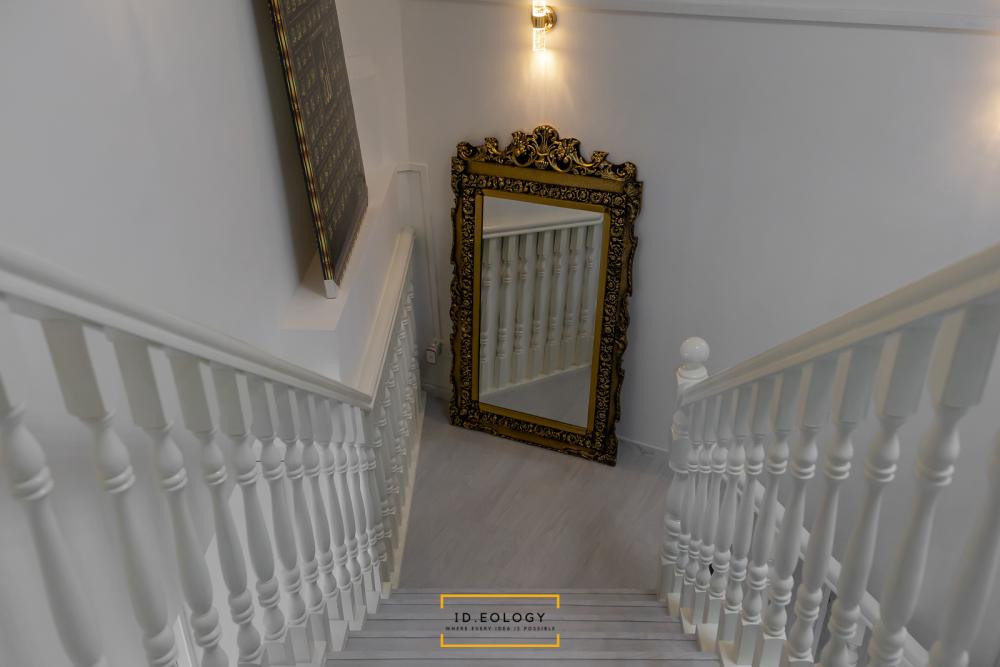 Country Hallway with Bookshelf and Artwork