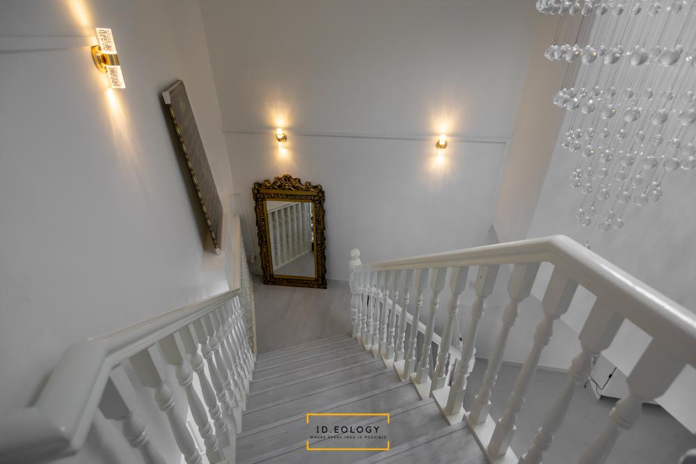 Country Hallway with Bookshelf and Artwork