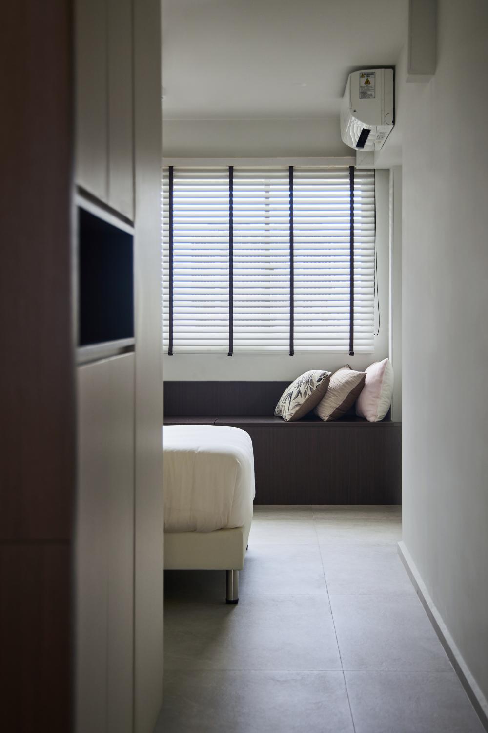 Contemporary Bedroom with Bookshelf and Homogeneous Tiles