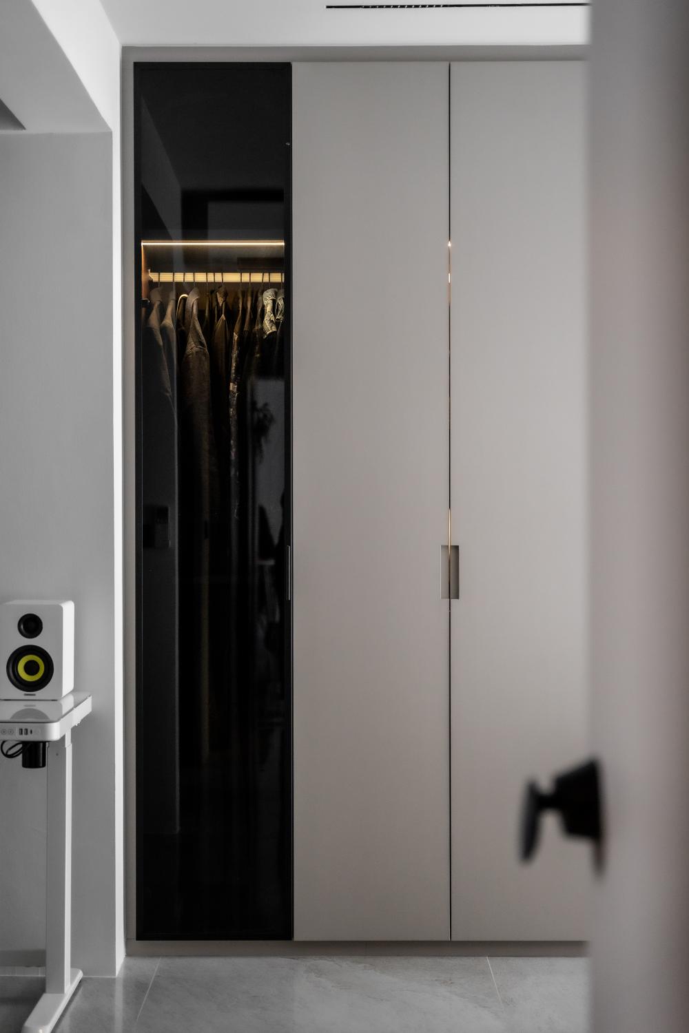 Minimalist Bedroom with Homogeneous Tiles and Wardrobe