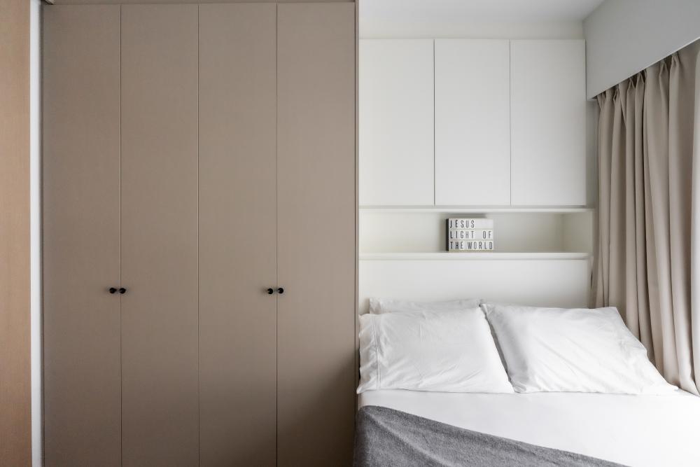 Minimalist Bedroom with Bookshelf and Platform Bed
