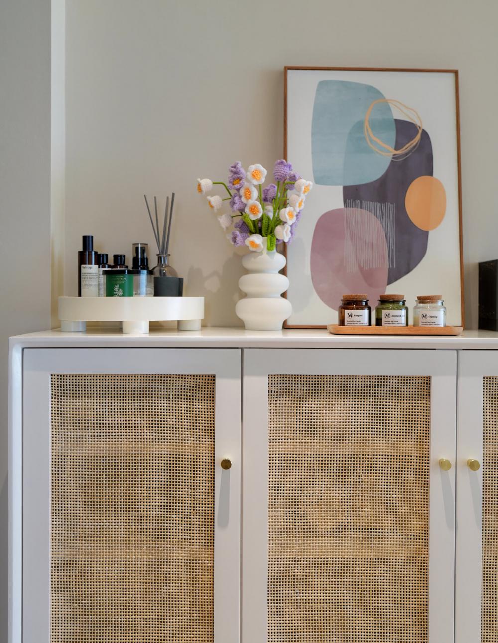 Scandinavian Foyer with Artwork and Planters