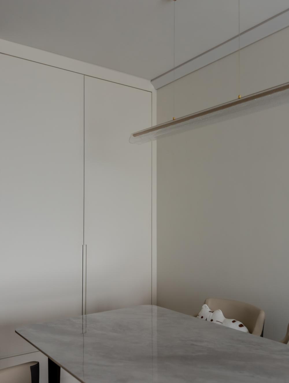 Modern Dining Room with Drop Light and Dining Table