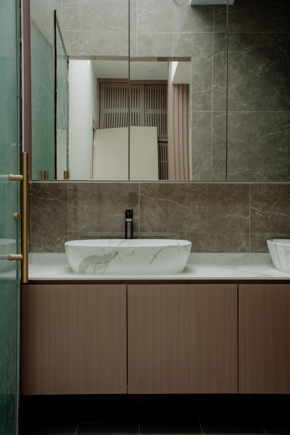 Modern Bathroom with Herringbone Tiling and Wood Flooring