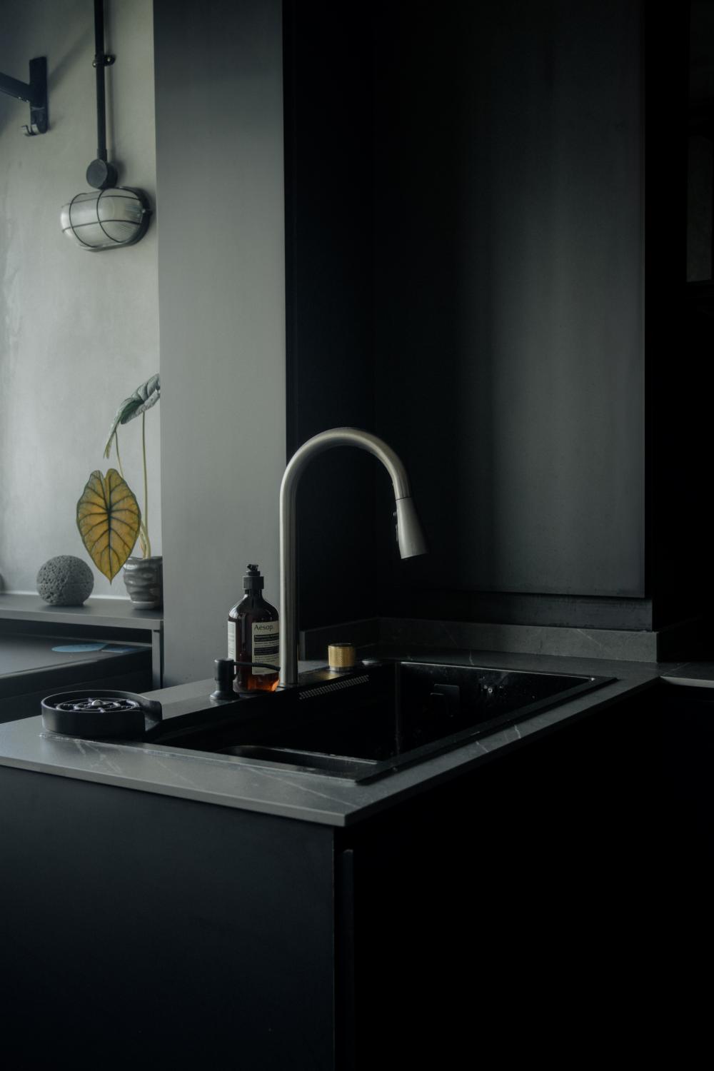 Industrial Kitchen with Herringbone Tiling and Parquet Floor