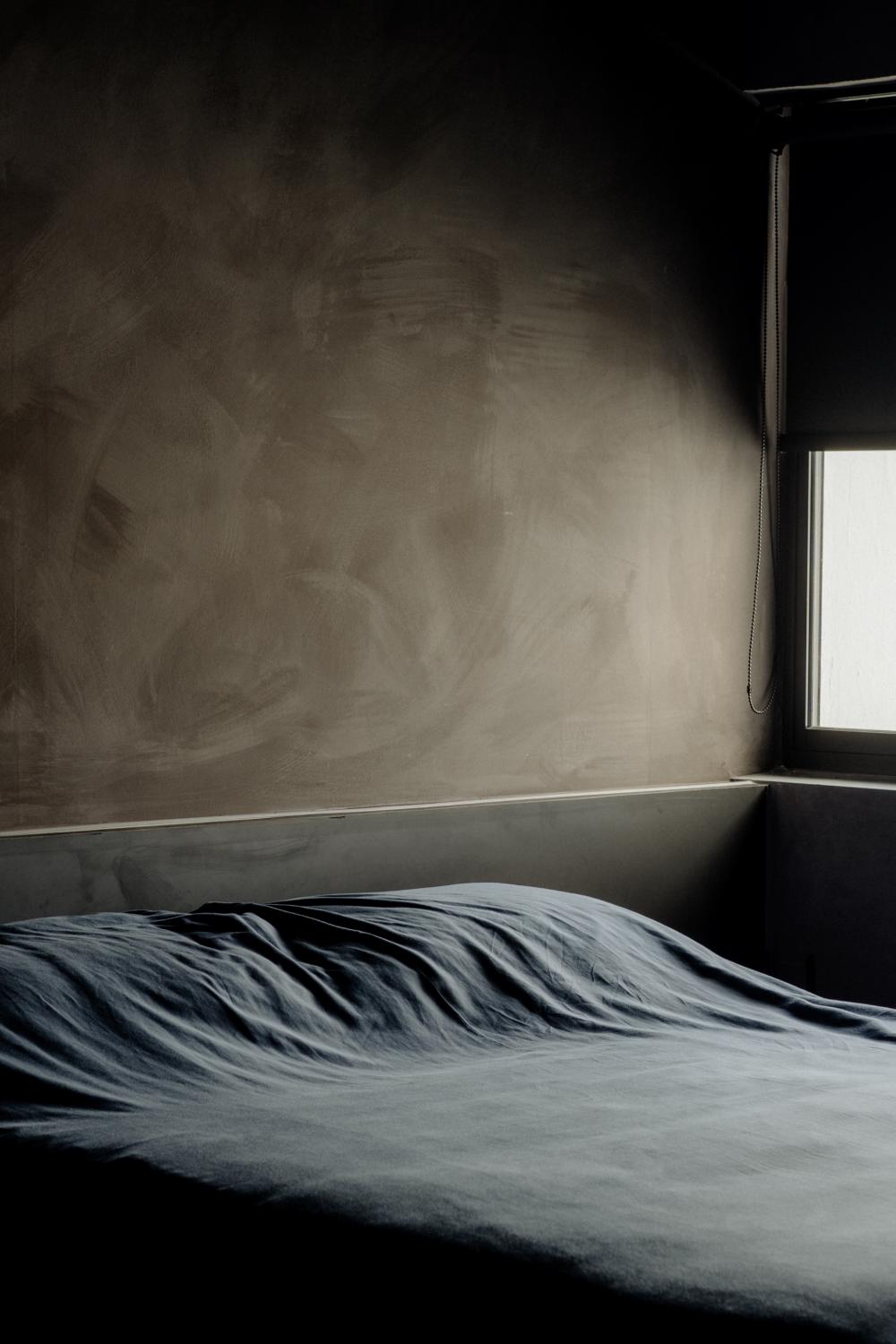Industrial Bedroom with Homogeneous Tiles and Cement Floor