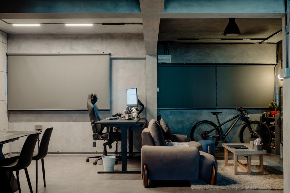Industrial Home Office with Wallpaper and Desk Chairs