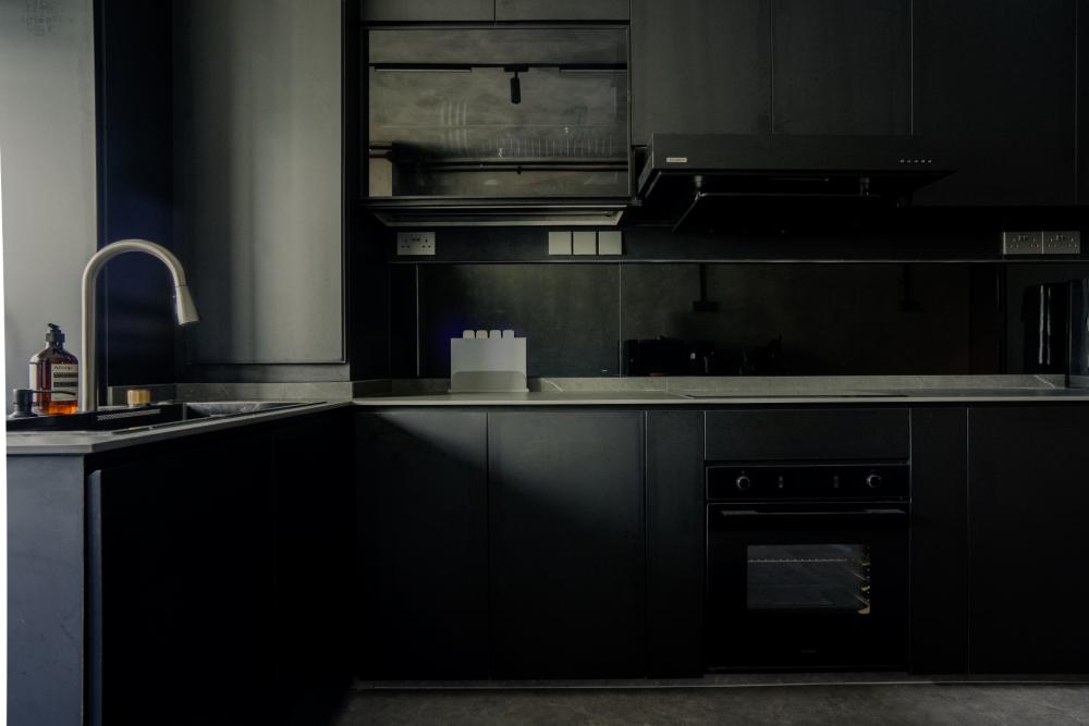 Industrial Kitchen with Herringbone Tiling and Cement Floor