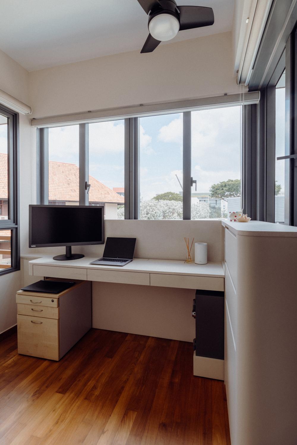 Modern Home Office with Bookshelf and Desk