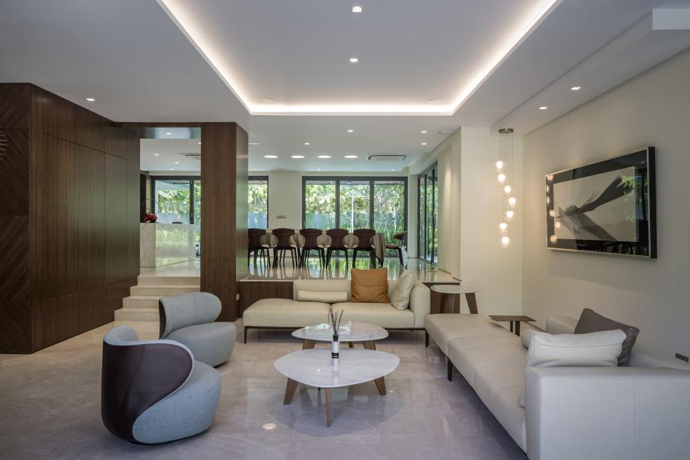 Contemporary Living Room with Marble Floor and Feature Wall