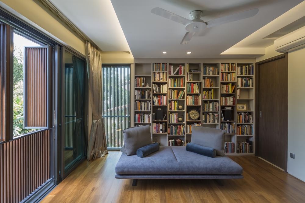Contemporary Study with Bookshelf and Cove Lighting