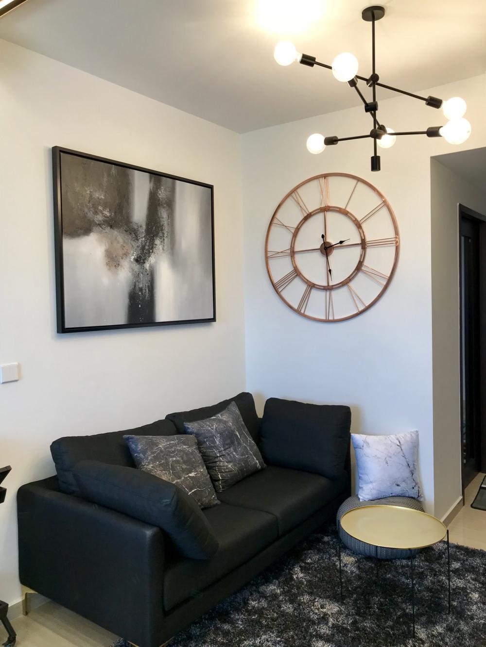 Minimalist Living Room with Sofa and Paintings
