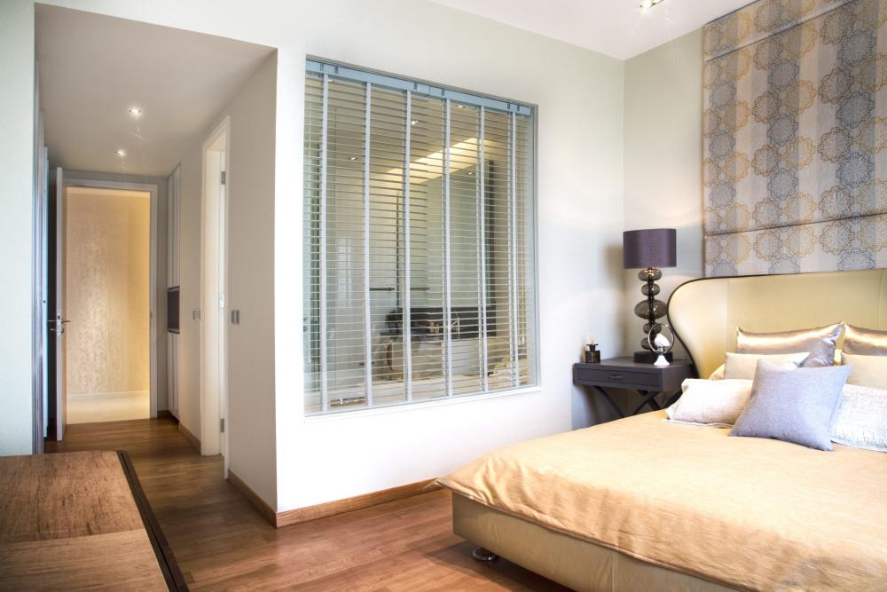 Contemporary Bedroom with Parquet Floor and Bedside Table