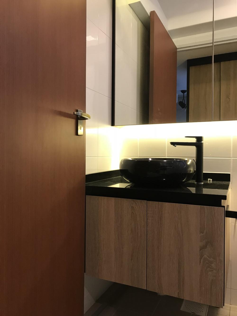 Industrial Bathroom with Countertop and Mirror
