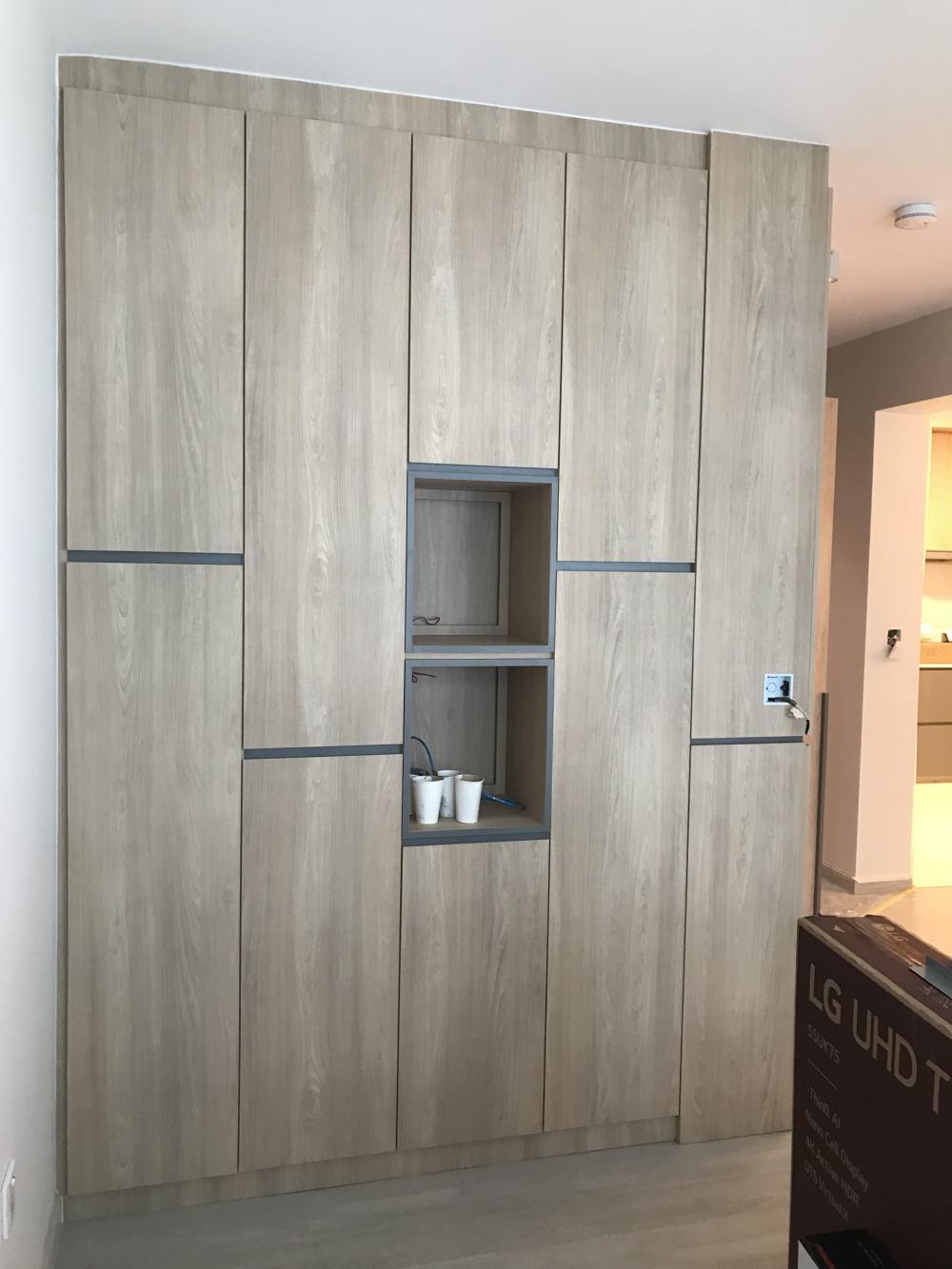 Contemporary Living Room with Feature Wall and Display Cabinets