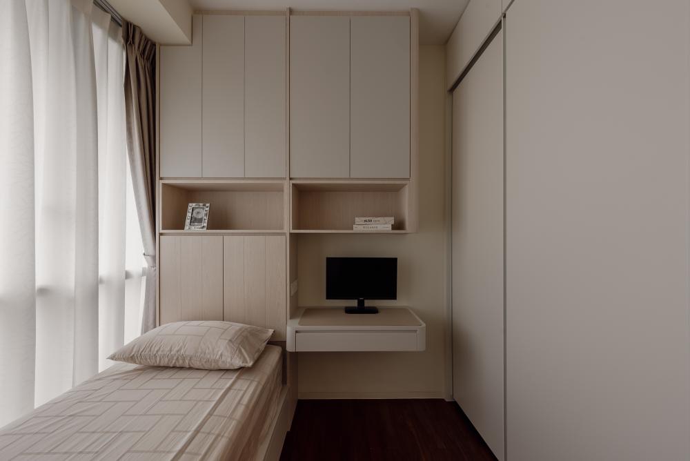Modern Bedroom with Bookshelf and Wood Flooring
