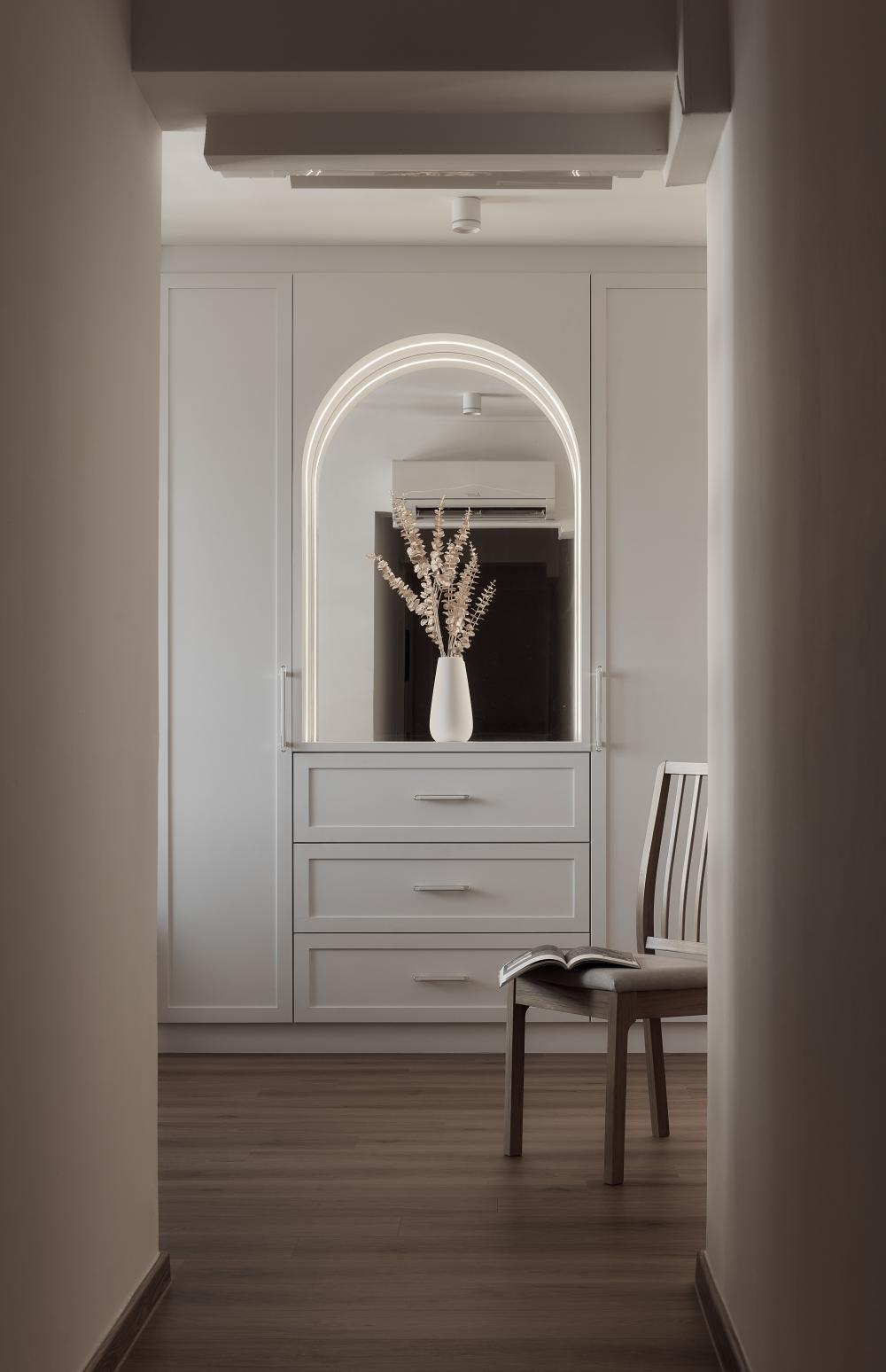 Modern Hallway with Wood Flooring and Storage Cabinets