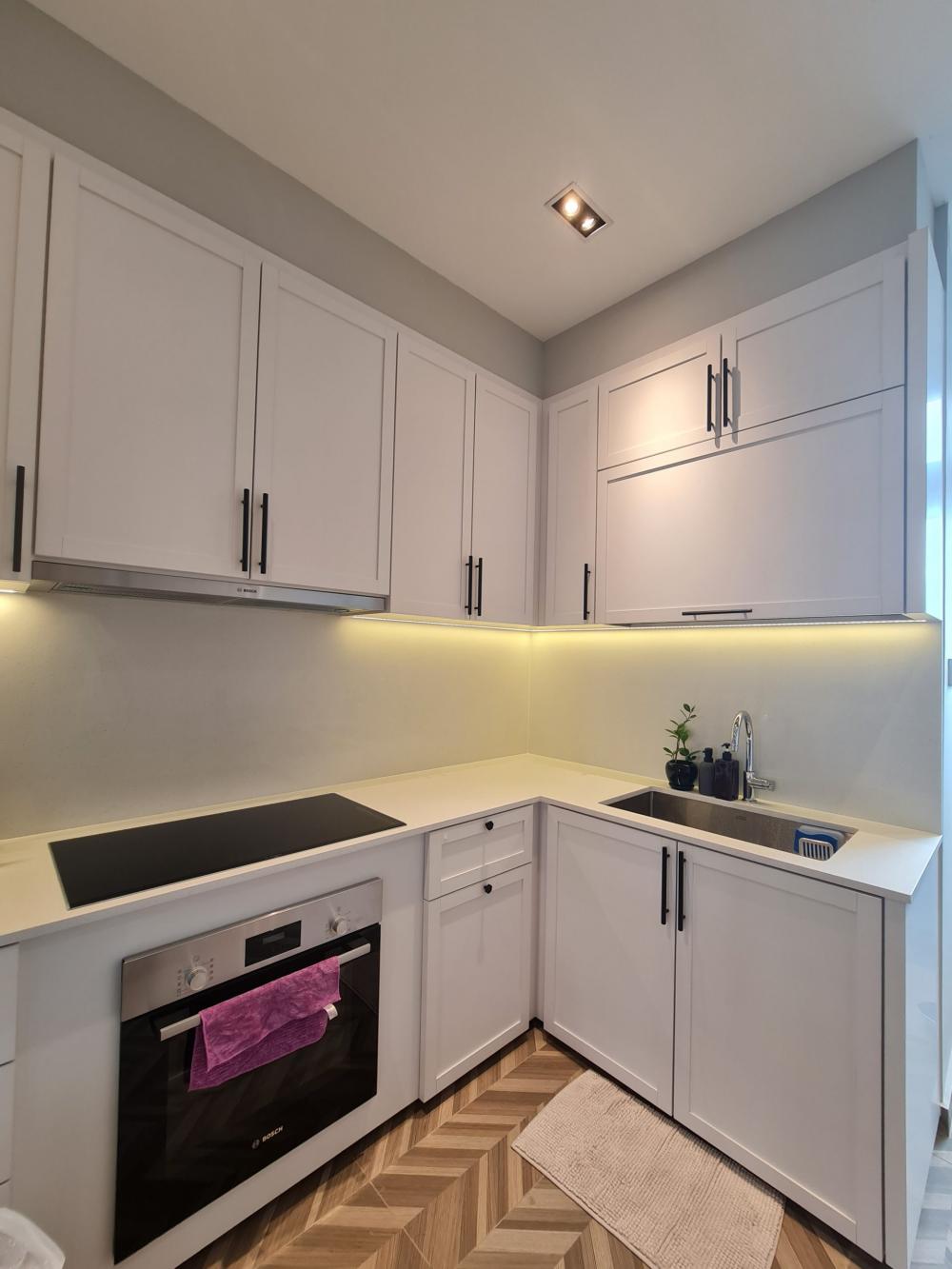 Vintage Kitchen with Countertop and Kitchen Backsplash