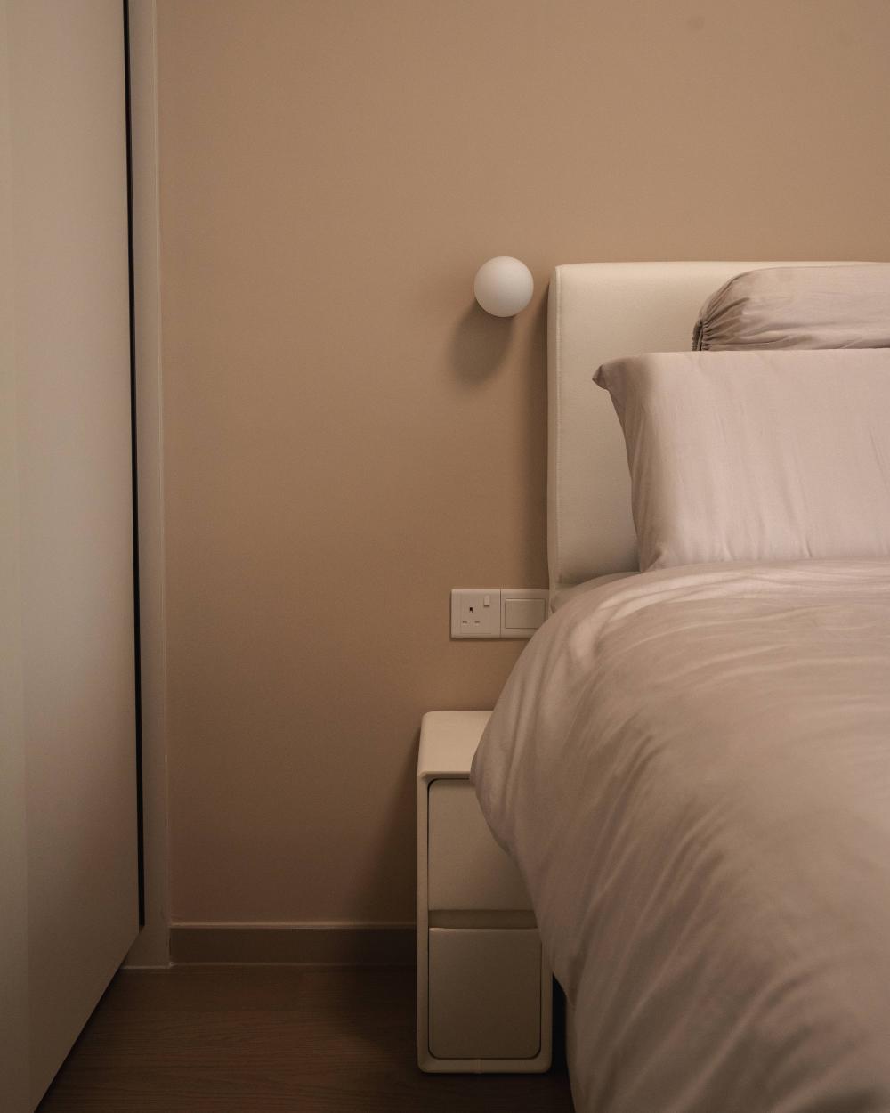Minimalist Bedroom with Cement Floor and Wood Flooring