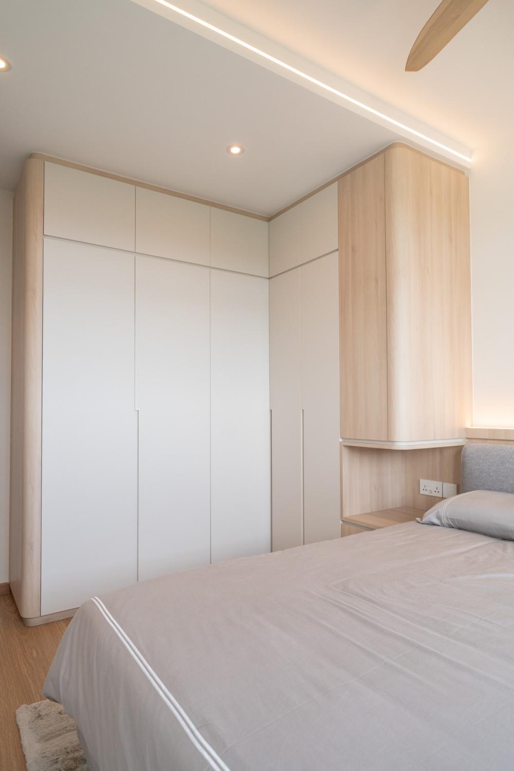 Minimalist Bedroom with Wood Flooring and Drop Light