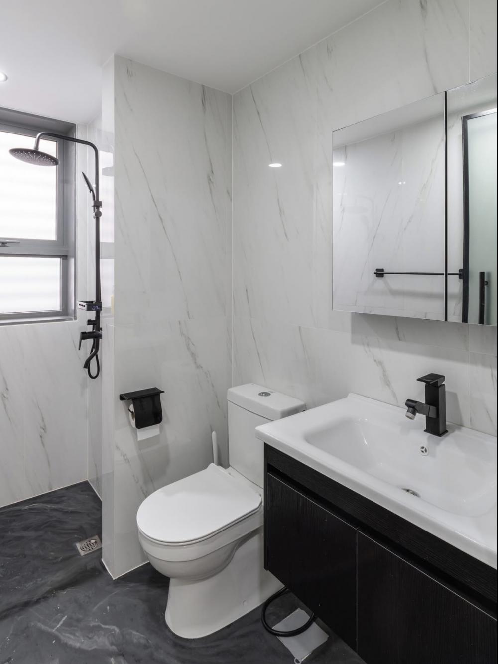 Modern Bathroom with Homogeneous Tiles and Mirror