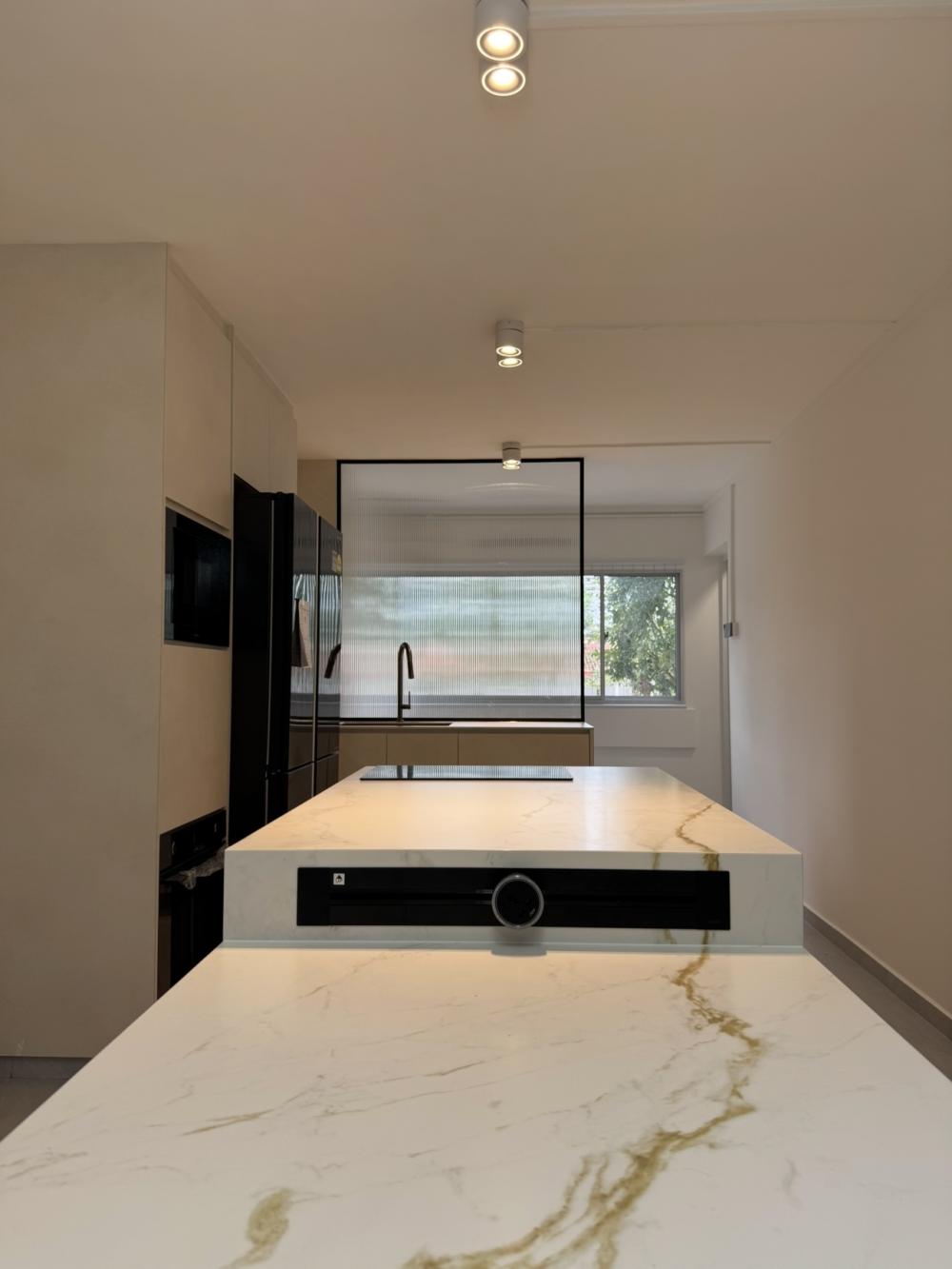 Minimalist Kitchen with Countertop and Homogeneous Tiles