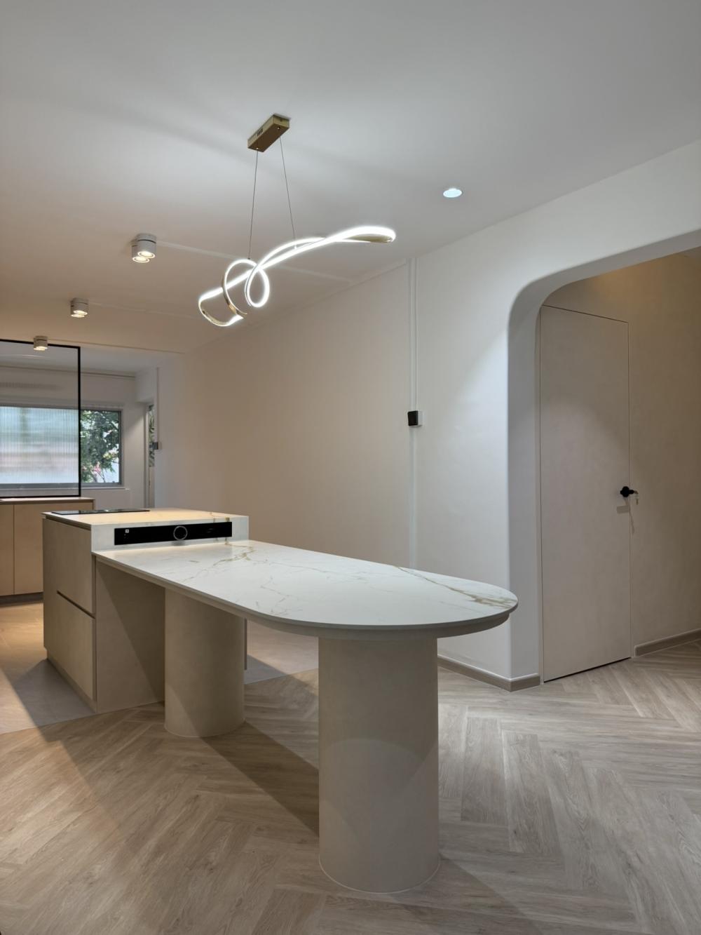 Minimalist Dining Room with Drop Light and Ceiling Light