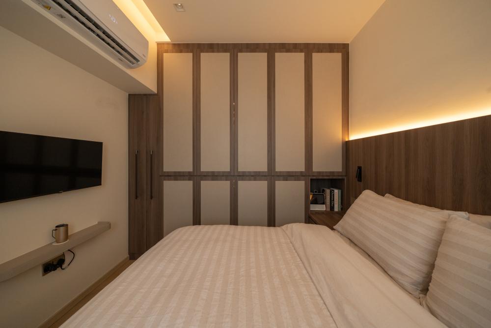 Contemporary Bedroom with Cove Lighting and Wardrobe